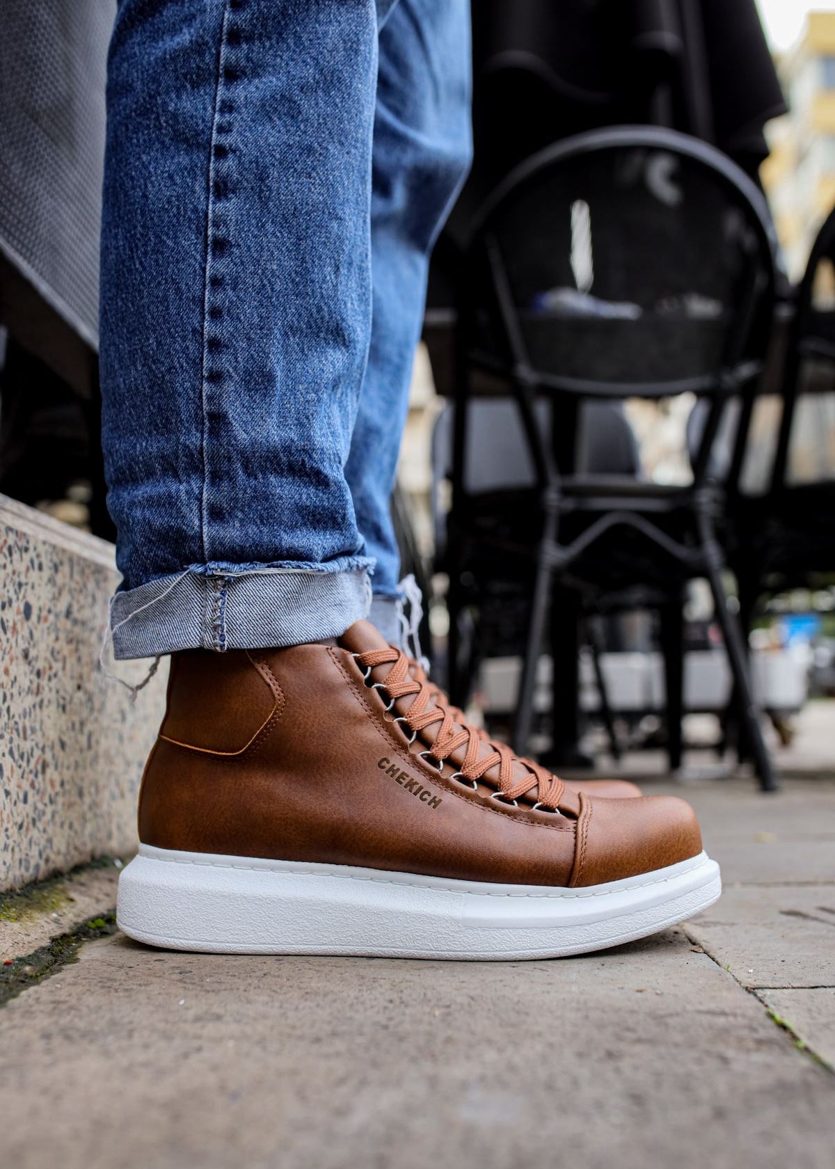 Men's Kelly Rustic Rendezvous by Apollo Moda, brown high-top boot worn with the laces tied