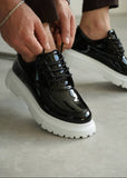 Men's Vantage Line by Apollo Moda, black gloss sneaker with contrasting white elevated sole, second angle