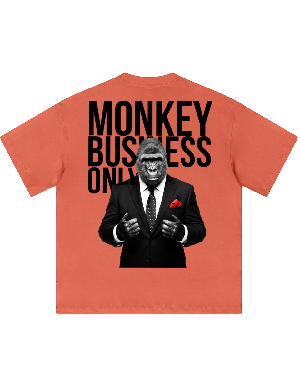 T-shirt with a gorilla in a suit graphic and 'Monkey Business Only' text on an orange background