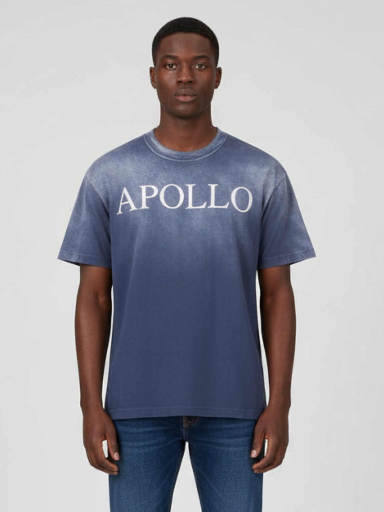 Person wearing a blue t-shirt with 'APOLLO' text on a plain background