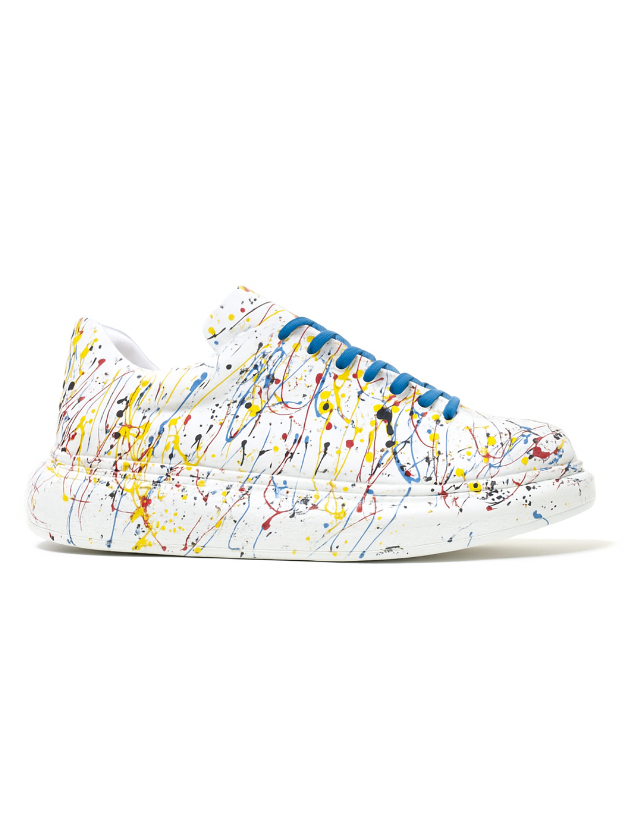 White sneaker with colorful splatter design on a white background