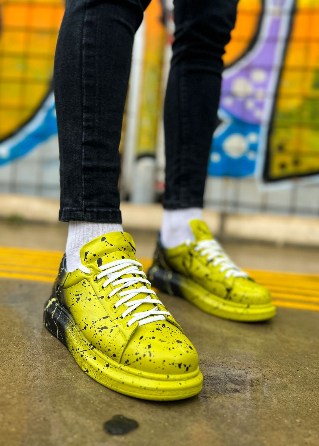 Men's Color Wave Vivid Fusion by Apollo Moda, hand-painted black sneaker with yellow splatter, second angle