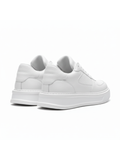White sneakers on a white background