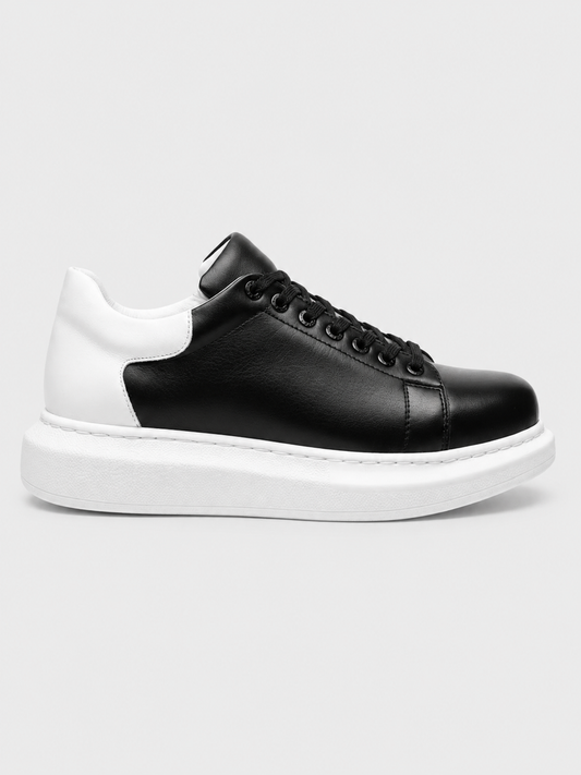 Pluto X low-top casual sneaker in black and white by Apollo Moda