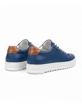 Men's Arion Azure by Apollo Moda, blue leather sneaker with perforated side panels, third angle