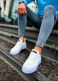 Kotor Pure Serenity knit sneaker in white by Apollo Moda, worn with blue jeans on steps