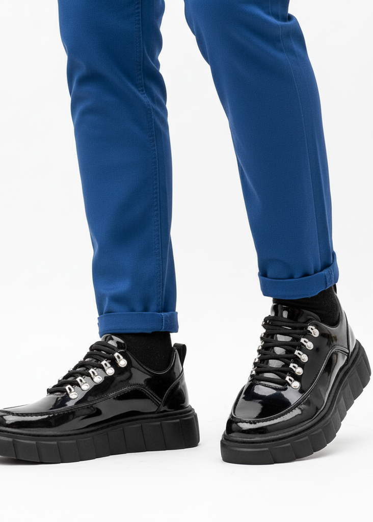 Men's Vega Obsidian by Apollo Moda, glossy black sneaker with elevating white sole, second angle
